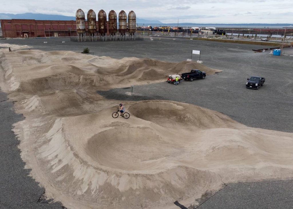 Birds view of trackside showing bike jumps and pump track